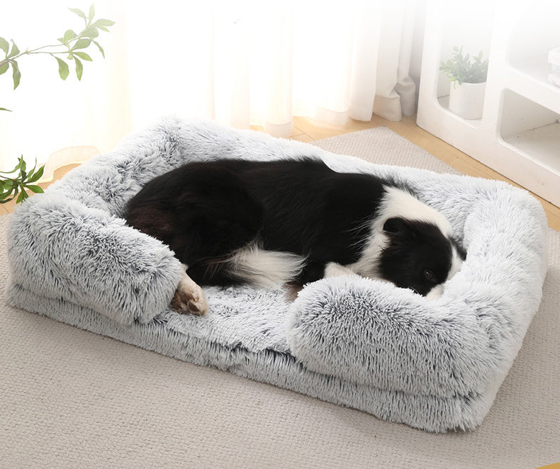 Comfortable dog bed with soft plush blanket, shown with a dog resting indoors.