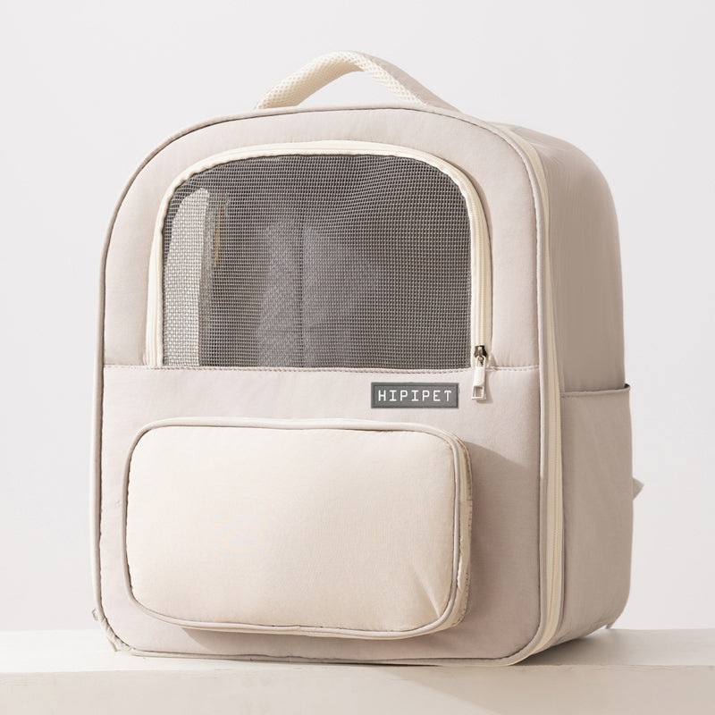 Beige pet carrier backpack with mesh window on a white background