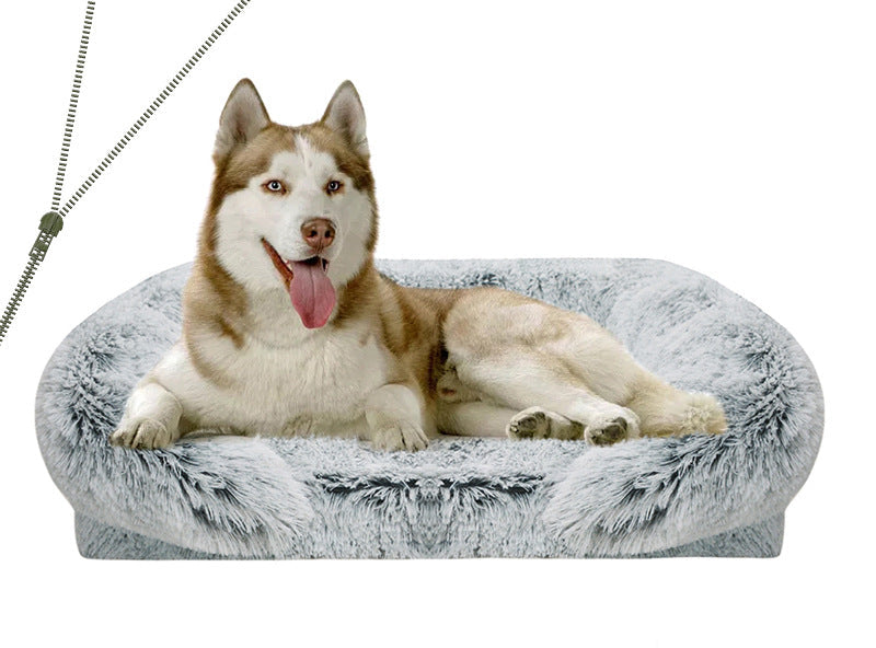 Dog lying on a fluffy pet bed.