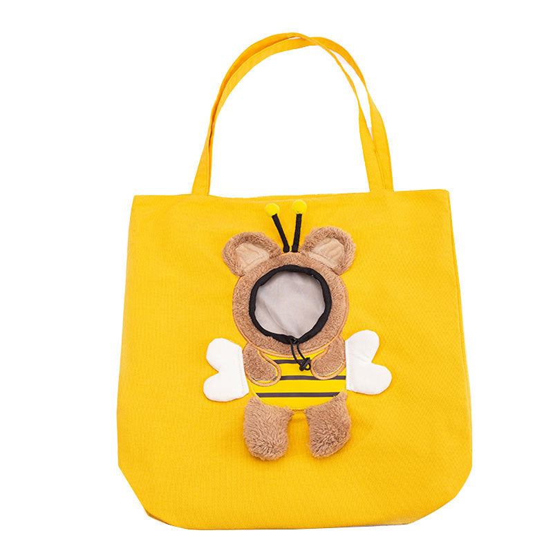 Yellow tote bag with a bee-themed plush toy on a white background