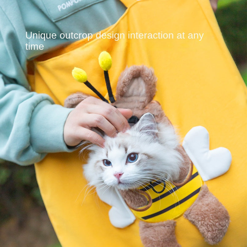 Cat wearing a bee costume held by a person with text overlay