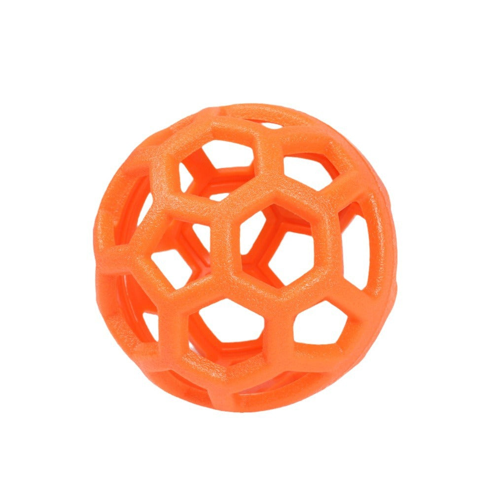 Orange hollow geometric dog chew ball with open lattice design made of polygon shapes.