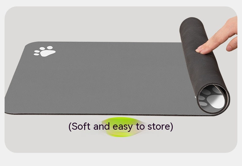 Gray mat with paw prints, rolled up mat on the side, and text 'Soft and easy to store' on a white background.