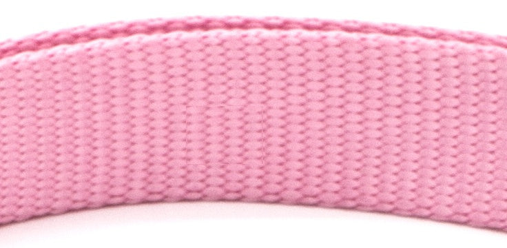Close-up of a pink woven belt strap on a white background