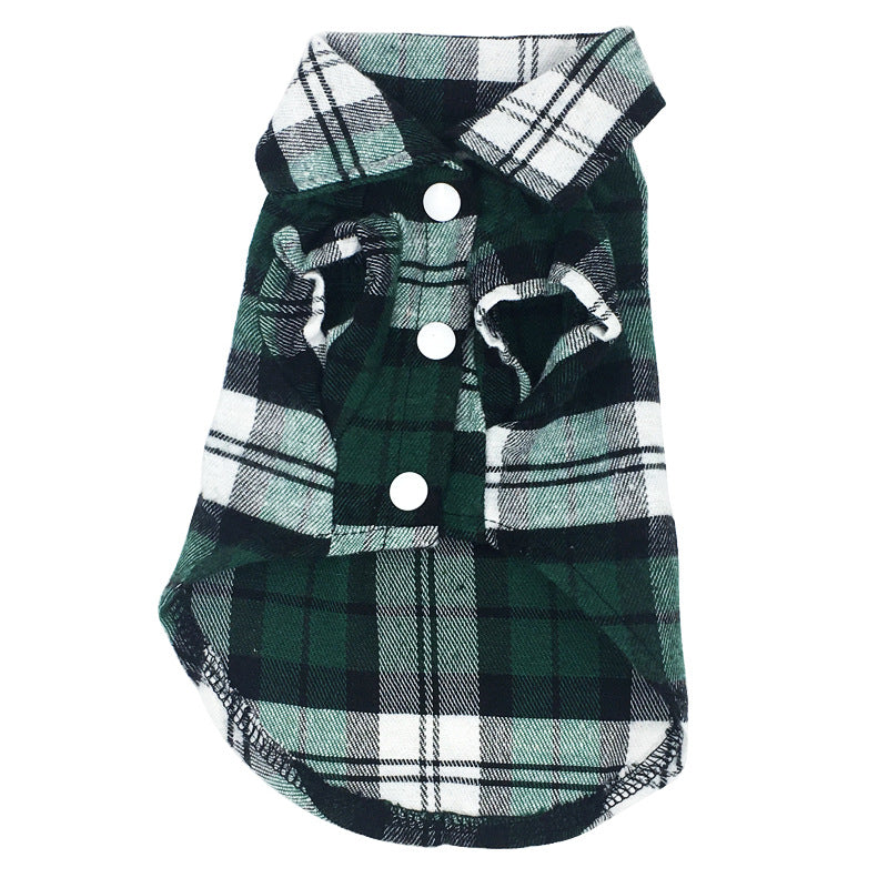 Green and white plaid dog shirt with buttons on a white background