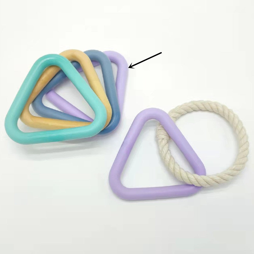 Set of colorful triangle-shaped pet toys with a rope on a white background