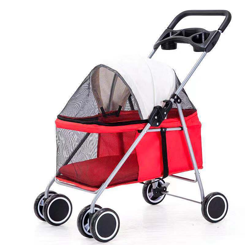 Red pet stroller with a black handle on a white background