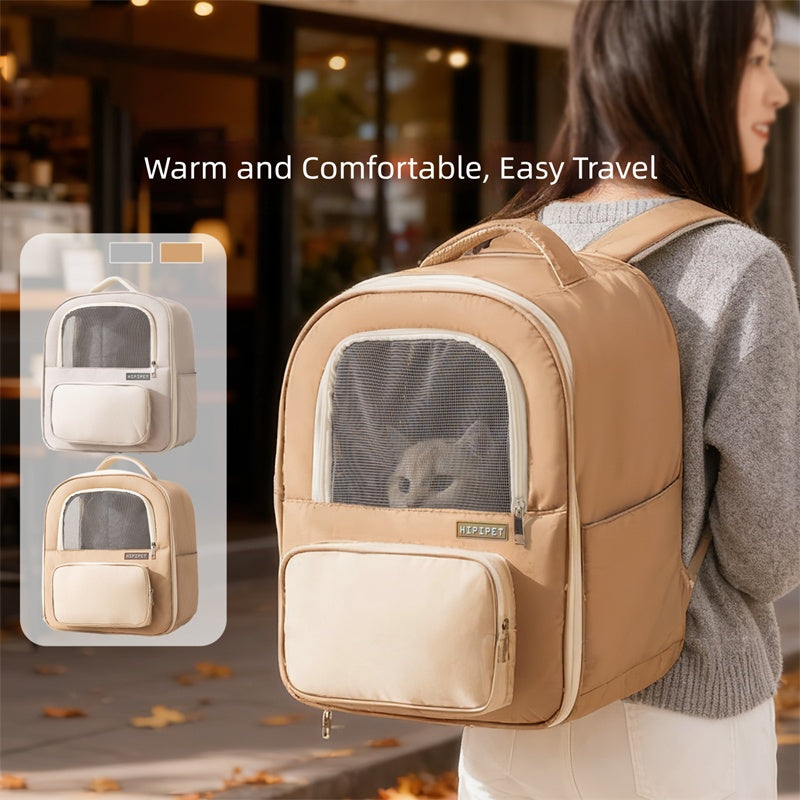 Person carrying a beige pet backpack with a cat inside, set against an urban background.